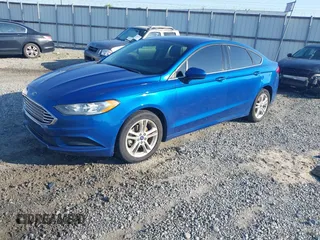 2018 Ford Fusion SE z VIN 3FA6P0H7XJR106776, wystawiony jako IAAI lot #42243361 z przebiegiem 174 000 mil mil oraz . Historia ofert i sprzedaży dostępna na DreamBid. Obrazek 17.