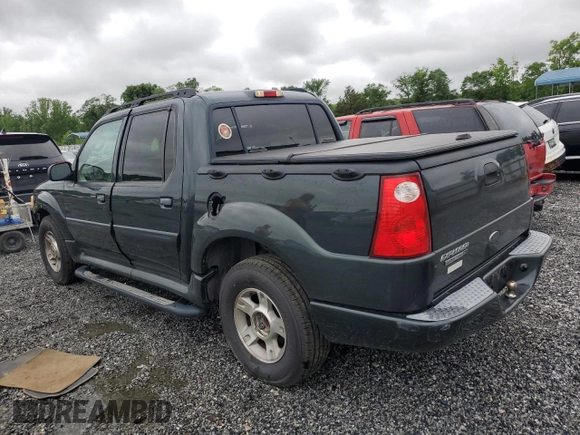 2004 Ford Explorer Sport Trac XLS with VIN 1FMZU67K04UA70503, listed as a Copart auction lot 58214785 with 195,688 mi miles and Salvage title. Bid and sale history available at DreamBid. Image 2.