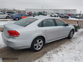2013 Volkswagen Passat SE w/Sunroof with VIN 1VWBH7A35DC005005, listed as a IAAI auction lot 41150825 with 90,467 mi miles. Bid and sale history available at carsss.com. Image 4.