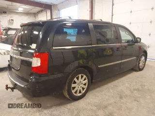 2015 Chrysler Town & Country Touring with VIN 2C4RC1BG6FR577855, listed as a IAAI auction lot 42187369 with 190,883 mi miles and . Bid and sale history available at carsss.com. Image 4.