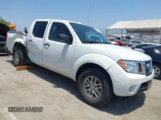 2014 Nissan Frontier SV with VIN 1N6AD0ER0EN725587, listed as a IAAI auction lot 42349058 with 101,191 mi miles and . Bid and sale history available at DreamBid. Image 1.