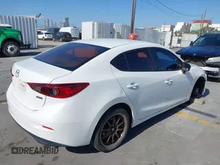2015 Mazda 3 i SV with VIN JM1BM1T71F1218642, listed as a IAAI auction lot 42142795 with 134,143 mi miles. Bid and sale history available at carsss.com. Image 4.