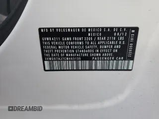 2012 Volkswagen Jetta SE z VIN 3VWDX7AJ7CM463135, wystawiony jako Copart lot #53800555 z przebiegiem 118 341 mil mil oraz Szkoda całkowita • Salvage title. Historia ofert i sprzedaży dostępna na DreamBid. Obrazek 13.