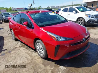 2020 Toyota Prius L Eco z VIN JTDKARFUXL3114644, wystawiony jako IAAI lot #42075713 z przebiegiem 78 853 mil mil oraz . Historia ofert i sprzedaży dostępna na DreamBid. Obrazek 1.
