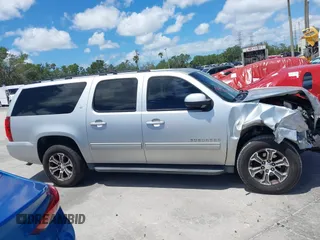 2012 Chevrolet Suburban LT with VIN 1GNSCJE04CR230288, listed as a IAAI auction lot 42049580 with 166,596 mi miles. Bid and sale history available at carsss.com. Image 13.