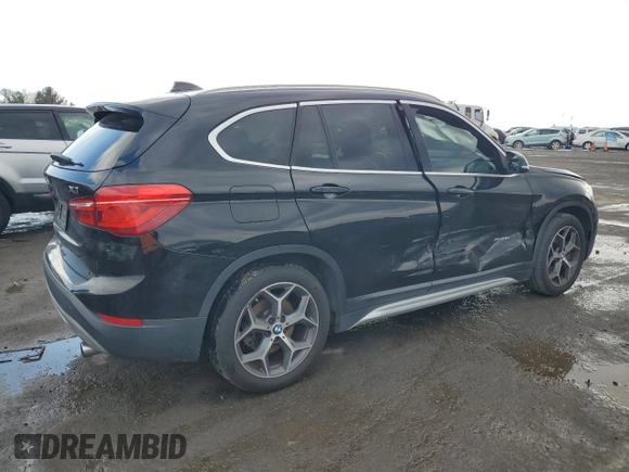 2016 BMW X1 xDrive28i with VIN WBXHT3C38G5E52301, listed as a Copart auction lot 88818445 with 91,221 mi miles and Salvage Title. Bid and sale history available at carsss.com. Image 3.