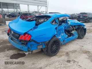 2017 Ford Mustang V6 with VIN 1FA6P8AMXH5228856, listed as a IAAI auction lot 42401297 with Not provided miles and . Bid and sale history available at DreamBid. Image 4.