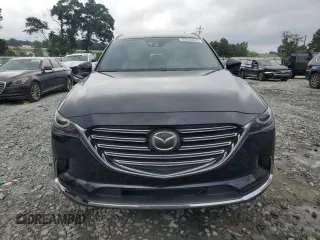 2016 Mazda CX-9 Grand Touring z VIN JM3TCADY7G0122768, wystawiony jako Copart lot #65624615 z przebiegiem 82 388 mil mil oraz Czysty tytuł • Clean title. Historia ofert i sprzedaży dostępna na DreamBid. Obrazek 5.
