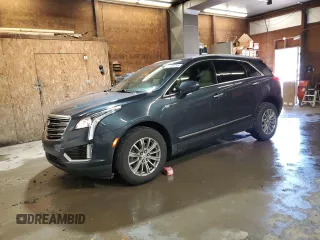 2019 Cadillac XT5 Luxury AWD z VIN 1GYKNDRS7KZ160956, wystawiony jako Copart lot #57154785 z przebiegiem 74 937 mil mil oraz Szkody całkowita. Historia ofert i sprzedaży dostępna na DreamBid. Obrazek 1.