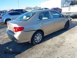 2009 Toyota Corolla with VIN 1NXBU40EX9Z049143, listed as a IAAI auction lot 41596503 with 94,255 mi miles. Bid and sale history available at carsss.com. Image 4.