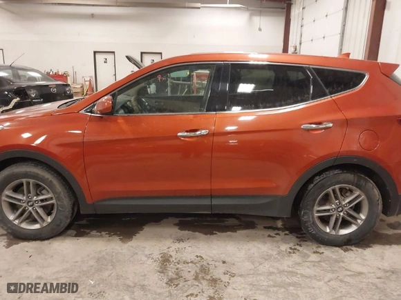2017 Hyundai Santa Fe Sport 2.4L with VIN 5XYZTDLB8HG439889, listed as a IAAI auction lot 41416462 with 140,602 mi miles. Bid and sale history available at carsss.com. Image 14.