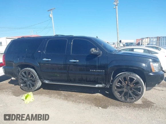 2011 Chevrolet Suburban LT with VIN 1GNSCJE06BR293634, listed as a IAAI auction lot 41742616 with 204,222 mi miles. Bid and sale history available at carsss.com. Image 13.