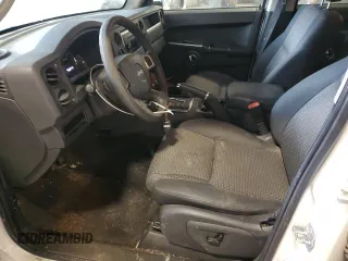 2010 Jeep Commander Sport z VIN 1J4RG4GK2AC158450, wystawiony jako Copart lot #46210865 z przebiegiem 222 500 mil mil oraz Szkoda całkowita • Salvage title. Historia ofert i sprzedaży dostępna na DreamBid. Obrazek 7.