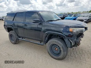 2015 Toyota 4Runner SR5 with VIN JTEZU5JRXF5101804, listed as a Copart auction lot 52541795 with 188,012 mi miles and Clean title. Bid and sale history available at DreamBid. Image 4.