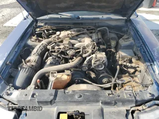 1999 Ford Mustang с VIN 1FAFP4049XF207029, выставлен на аукционе Copart как лот 60026465 с пробегом 158 209 миль миль и Списание • Salvage title. История ставок и продаж доступна на DreamBid. Изображение 11.
