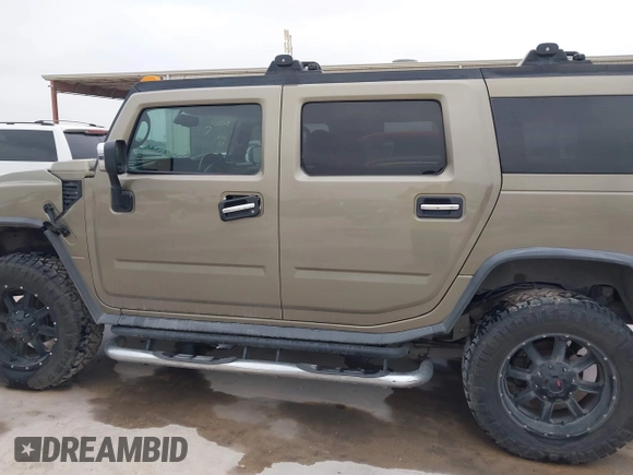 2005 Hummer H2 SUV z VIN 5GRGN23U95H132238, wystawiony jako IAAI lot #41809909 z przebiegiem 300 293 mil mil oraz . Historia ofert i sprzedaży dostępna na DreamBid. Obrazek 14.