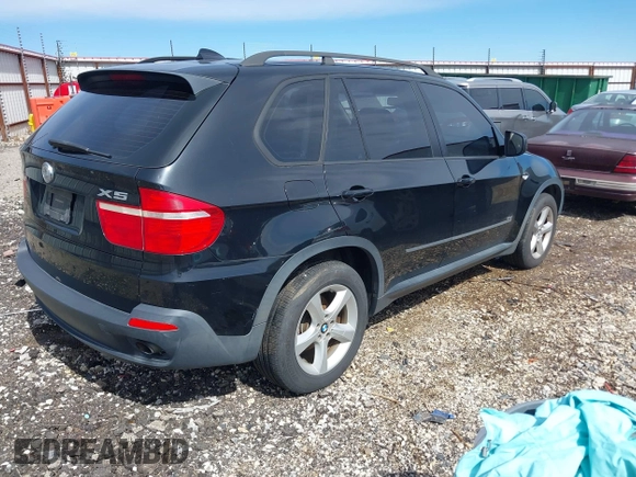 2008 BMW X5 3.0si with VIN 5UXFE43548L009495, listed as a IAAI auction lot 41694127 with 165,173 mi miles. Bid and sale history available at carsss.com. Image 4.