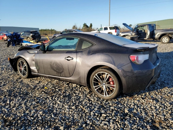 2013 Subaru BRZ Limited with VIN JF1ZCAC13D1604849, listed as a Copart auction lot 87024074 with 87,437 mi miles and Salvage Title. Bid and sale history available at carsss.com. Image 2.