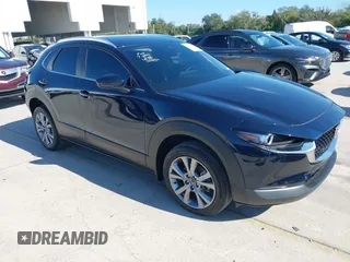 2023 Mazda CX-30 2.5 S Preferred Package with VIN 3MVDMBCM6PM587455, listed as a IAAI auction lot 41142578 with 23,551 mi miles. Bid and sale history available at carsss.com. Image 1.