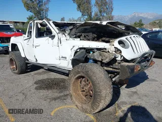 2020 Jeep Gladiator Overland z VIN 1C6HJTFGXLL127886, wystawiony jako IAAI lot #41151352 z przebiegiem Nie podano mil oraz . Historia ofert i sprzedaży dostępna na DreamBid. Obrazek 1.