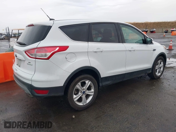2015 Ford Escape SE with VIN 1FMCU0GXXFUB96076, listed as a IAAI auction lot 40914596 with 134,066 mi miles. Bid and sale history available at carsss.com. Image 4.