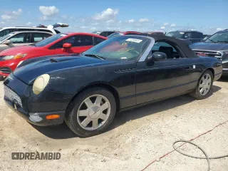 2002 Ford Thunderbird Hardtop Premium z VIN 1FAHP60A42Y128441, wystawiony jako Copart lot #74899624 z przebiegiem Nie podano mil oraz Nie do naprawy • Non repairable. Historia ofert i sprzedaży dostępna na DreamBid. Obrazek 1.