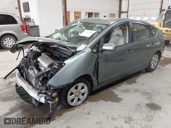 2005 Toyota Prius with VIN JTDKB20U453123405, listed as a IAAI auction lot 42080386 with 262,688 mi miles and . Bid and sale history available at DreamBid. Image 18.