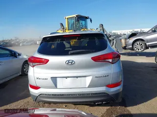 2016 Hyundai Tucson Sport with VIN KM8J33A20GU152145, listed as a IAAI auction lot 41250885 with 117,841 mi miles. Bid and sale history available at carsss.com. Image 16.