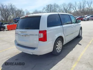 2016 Chrysler Town & Country Touring with VIN 2C4RC1BGXGR269055, listed as a IAAI auction lot 41861795 with 207,118 mi miles. Bid and sale history available at carsss.com. Image 4.
