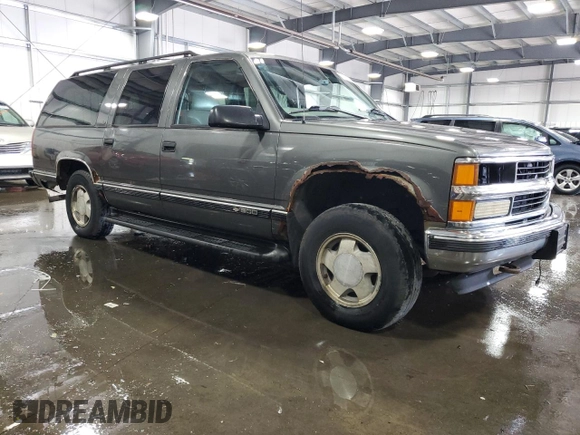 1999 Chevrolet Suburban with VIN 3GNFK16R8XG149091, listed as a Copart auction lot 71300024 with 254,044 mi miles and Salvage Title. Bid and sale history available at carsss.com. Image 4.