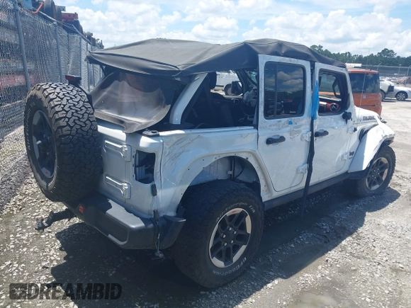 2022 Jeep Wrangler Unlimited Rubicon с VIN 1C4HJXFN4NW123610, выставлен на аукционе IAAI как лот 42499828 с пробегом 45 083 миль миль и . История ставок и продаж доступна на DreamBid. Изображение 4.