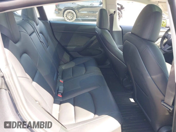 2023 Tesla Model 3 Long Range with VIN 5YJ3E1EB4PF635328, listed as a IAAI auction lot 41978099 with 32,747 mi miles and . Bid and sale history available at DreamBid. Image 8.