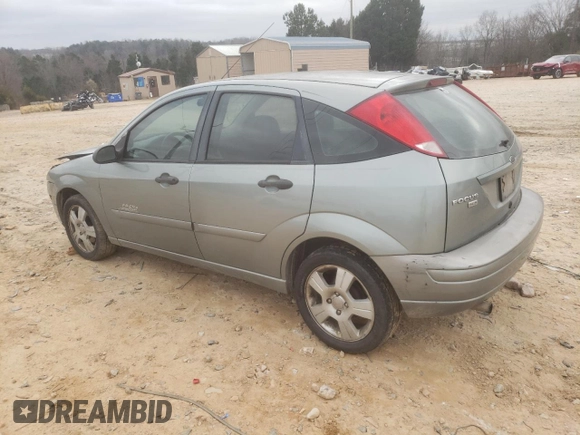 2006 Ford Focus S with VIN 1FAHP37N76W180039, listed as a Copart auction lot 58328565 with 220,696 mi miles and Salvage title. Bid and sale history available at DreamBid. Image 2.