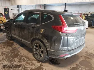 2018 Honda CR-V Touring with VIN 2HKRW2H94JH635053, listed as a IAAI auction lot 41611501 with 76,883 mi miles. Bid and sale history available at carsss.com. Image 3.