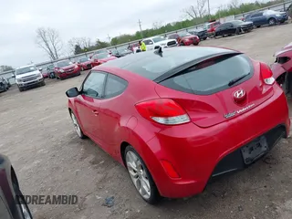 2013 Hyundai Veloster w/Gray Int z VIN KMHTC6AD8DU146035, wystawiony jako IAAI lot #41892703 z przebiegiem 241 169 mil mil oraz . Historia ofert i sprzedaży dostępna na DreamBid. Obrazek 14.