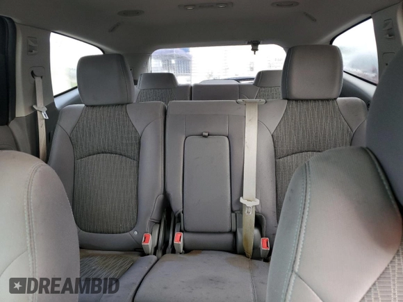 2015 Chevrolet Traverse LS z VIN 1GNKRFED6FJ113457, wystawiony jako Copart lot #55216895 z przebiegiem Nie podano mil oraz Szkoda całkowita • Salvage title. Historia ofert i sprzedaży dostępna na DreamBid. Obrazek 10.