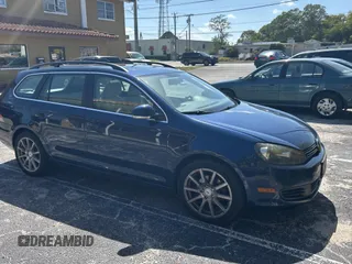 2011 Volkswagen Jetta SportWagen SE with VIN 3VWPX7AJ9BM693836, listed as a Copart auction lot 52215095 with 153,570 mi miles and Clean Title. Bid and sale history available at carsss.com. Image 1.