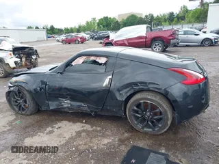 2020 Nissan 370Z Sport z VIN JN1AZ4EH6LM823399, wystawiony jako IAAI lot #42135621 z przebiegiem 98 855 mil mil oraz . Historia ofert i sprzedaży dostępna na DreamBid. Obrazek 15.