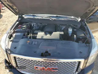2016 GMC Yukon Denali with VIN 1GKS2CKJ9GR301628, listed as a Copart auction lot 48937035 with 121,863 mi miles and Salvage Title. Bid and sale history available at carsss.com. Image 12.