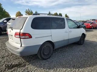2001 Toyota Sienna LE with VIN 4T3ZF13C61U362980, listed as a Copart auction lot 71986484 with 188,556 mi miles and Salvage Title. Bid and sale history available at carsss.com. Image 3.