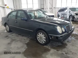 1997 Mercedes-Benz E-Class with VIN WDBJF55F8VA415421, listed as a IAAI auction lot 41536015 with 237,345 mi miles. Bid and sale history available at carsss.com. Image 1.