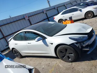 2022 Tesla Model 3 with VIN 5YJ3E1EA7NF103513, listed as a IAAI auction lot 41643592 with 35,631 mi miles and . Bid and sale history available at DreamBid. Image 13.