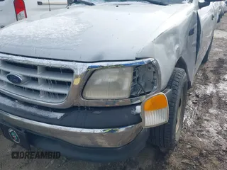 1999 Ford F-150 with VIN 1FTZF1726XNB02953, listed as a IAAI auction lot 41565566 with 180,775 mi miles and . Bid and sale history available at DreamBid. Image 6.