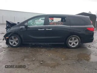 2019 Honda Odyssey EX-L with VIN 5FNRL6H76KB116195, listed as a IAAI auction lot 41078250 with 106,922 mi miles. Bid and sale history available at carsss.com. Image 14.