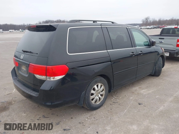 2010 Honda Odyssey EX-L with VIN 5FNRL3H73AB078714, listed as a IAAI auction lot 41520151 with 218,466 mi miles and . Bid and sale history available at DreamBid. Image 4.
