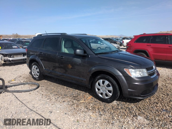 2016 Dodge Journey SE with VIN 3C4PDCAB4GT249709, listed as a Copart auction lot 52209685 with 143,923 mi miles and Salvage Title. Bid and sale history available at carsss.com. Image 4.