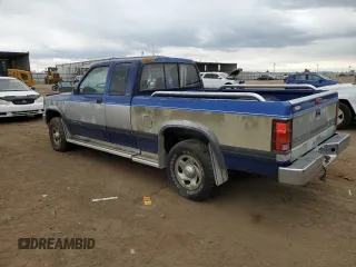 1995 Dodge Dakota z VIN 1B7GG23Y4SS124349, wystawiony jako Copart lot #55723114 z przebiegiem 136 156 mil mil oraz Tytuł czysty. Historia ofert i sprzedaży dostępna na DreamBid. Obrazek 2.