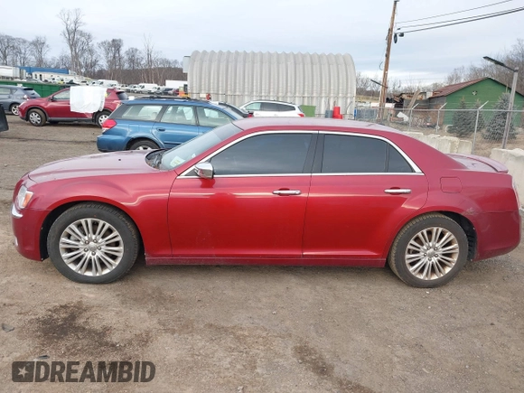2012 Chrysler 300 C with VIN 2C3CCAKT4CH217217, listed as a IAAI auction lot 41502473 with 193,258 mi miles and . Bid and sale history available at DreamBid. Image 14.