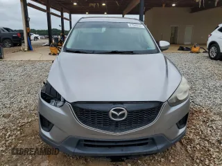 2015 Mazda CX-5 Sport z VIN JM3KE2BE4F0459532, wystawiony jako Copart lot #61049235 z przebiegiem 149 808 mil mil oraz Szkoda całkowita • Salvage title. Historia ofert i sprzedaży dostępna na DreamBid. Obrazek 5.