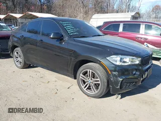 2019 BMW X6 xDrive35i with VIN 5UXKU2C50K0Z62820, listed as a IAAI auction lot 41006008 with 79,104 mi miles. Bid and sale history available at carsss.com. Image 1.